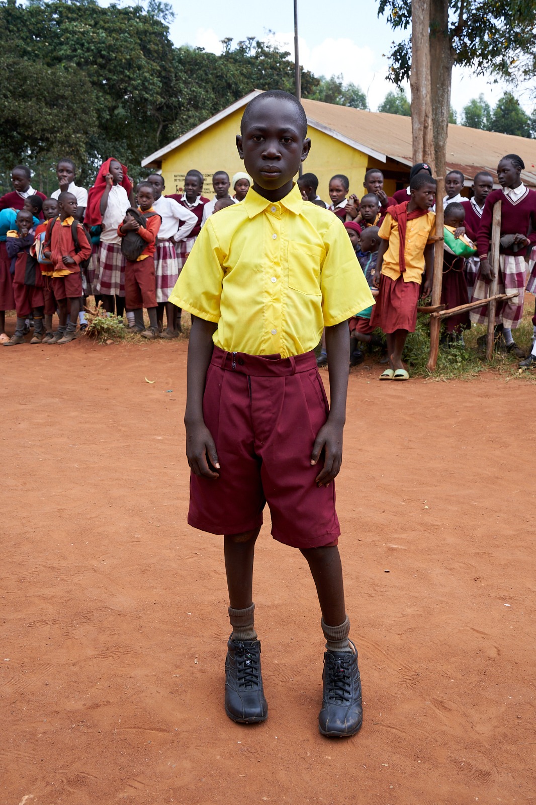 After: a learner in his new school uniform